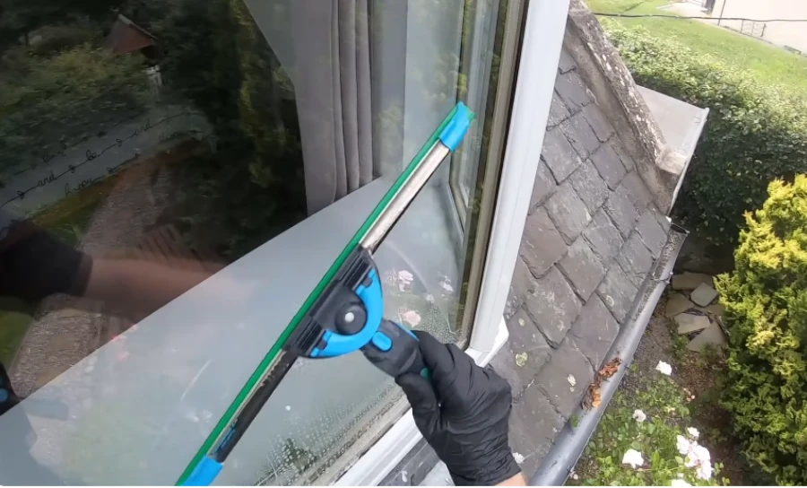 Salt residue buildup on windows of a coastal home in Wilmington, NC